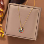 Gold-tone chain necklace with colorful painted flower round pendant