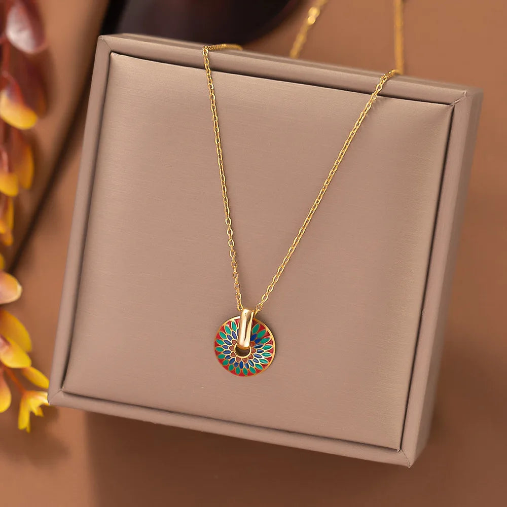 Gold-tone chain necklace with colorful painted flower round pendant