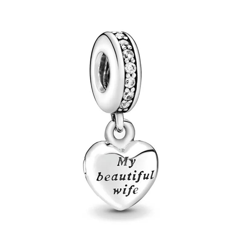 Sterling silver heart charm with “My beautiful wife” engraving and crystal trim