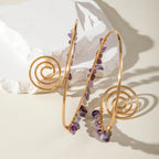Gold-tone upper arm bracelets with spiral charm and purple stone bead strands