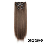 Dark brown straight clip-in hair extension with metal comb clips at the top