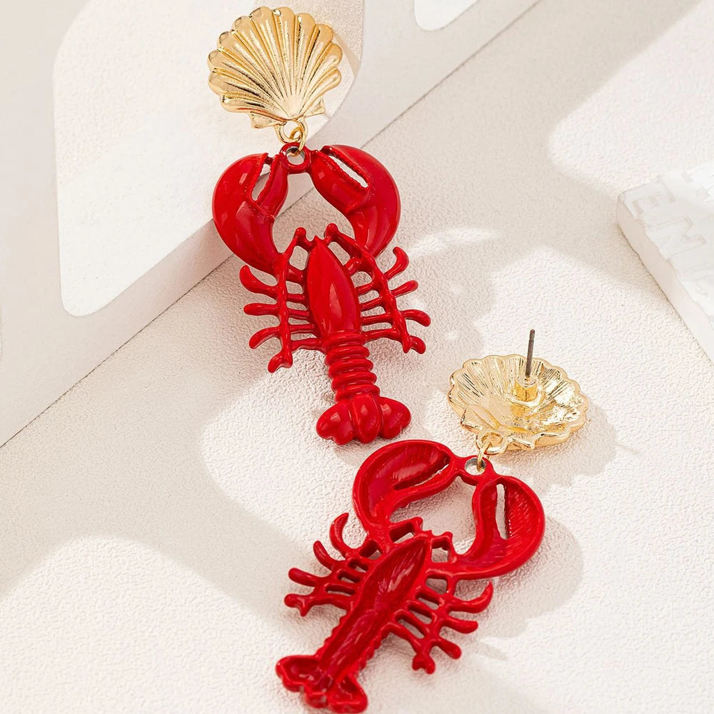 Red lobster charm earrings with gold scallop shell tops and dangling lobster shape