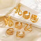 Geometric stacking rings assortment, gold-tone open wave bands in multiple shapes