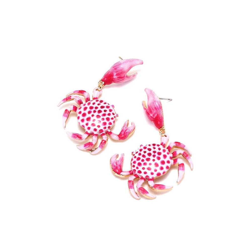 Crab enamel drop earrings with red-and-white dotted bodies, pink claws, and gold hooks