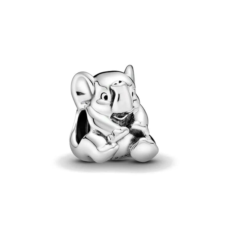 Sterling silver elephant charm bead with raised trunk, heart-shaped detail, bracelet loop