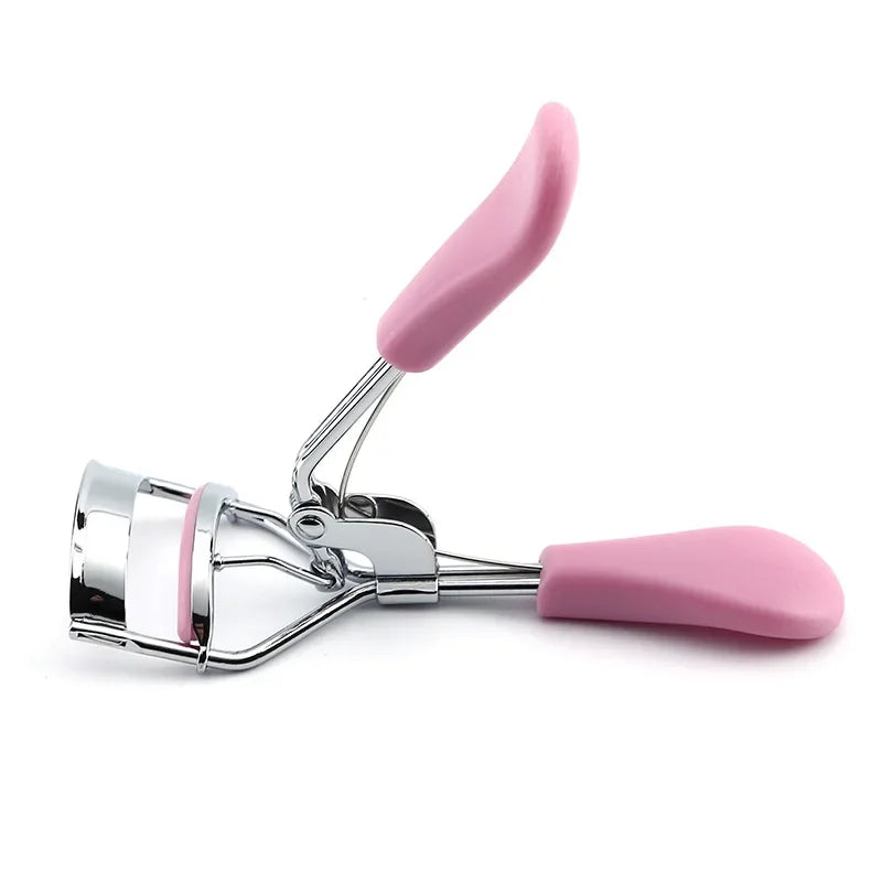 Eyelash curler tool with pink silicone handle and chrome curler frame