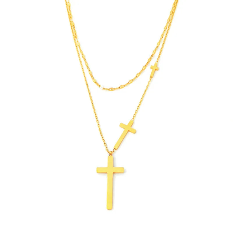 Gold double-layer cross pendant necklace with two gold cross charms