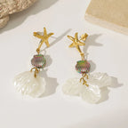 Two gold starfish drop earrings with rainbow shell bead and white layered petal dangles