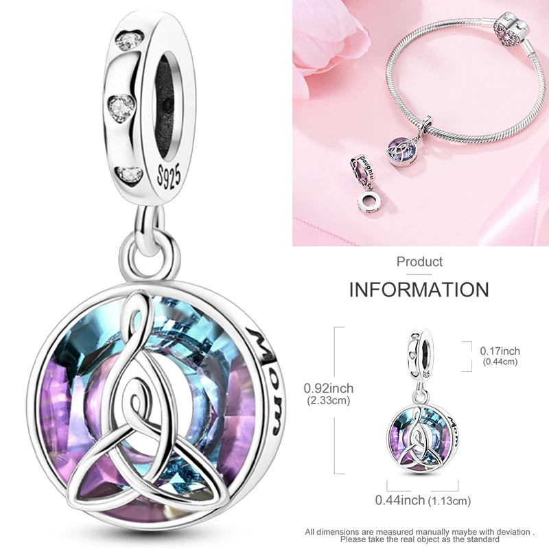Sterling silver circular charm bead with blue and purple enamel star detail