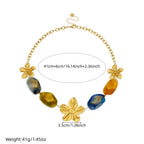 Gold-tone resin bead necklace with flower pendants and multicolor oval beads