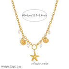Gold-plated starfish pendant necklace featuring shell charm and white pearl beads on chain