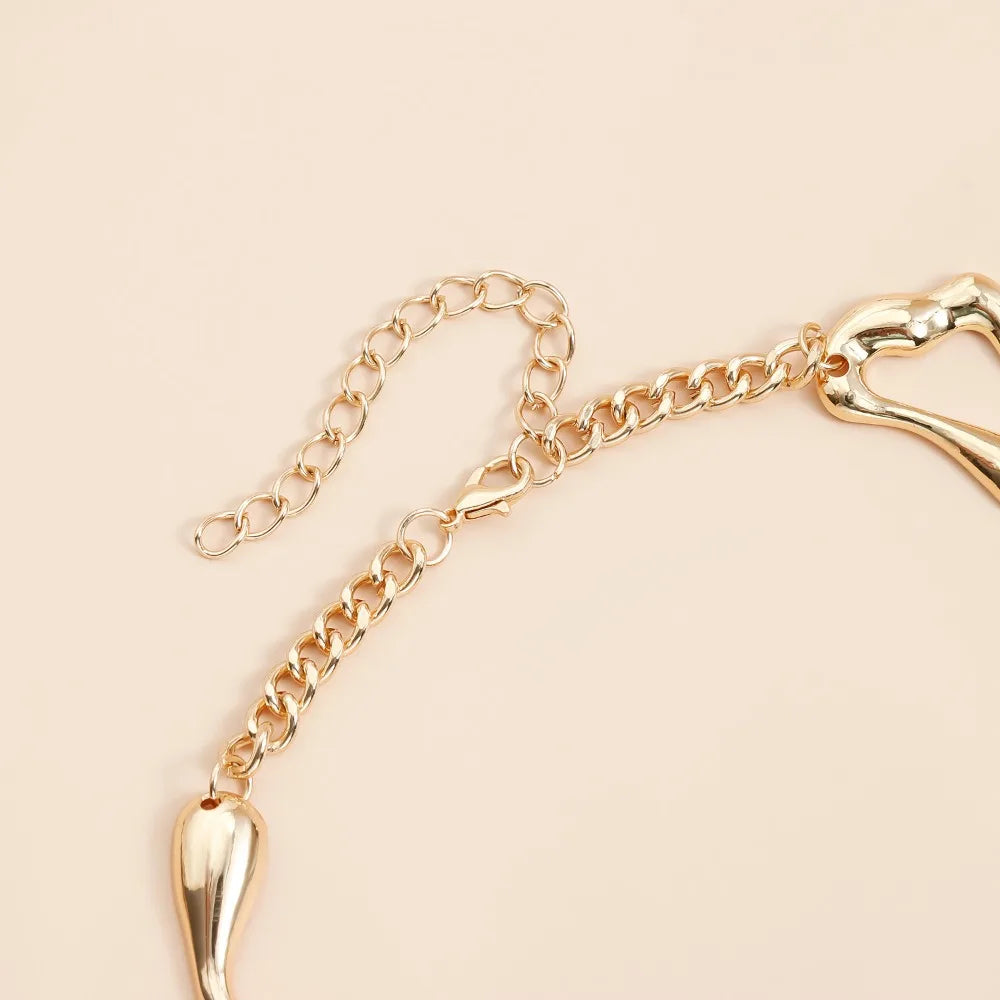Gold-tone necklace chain with clasp and lava drip detail
