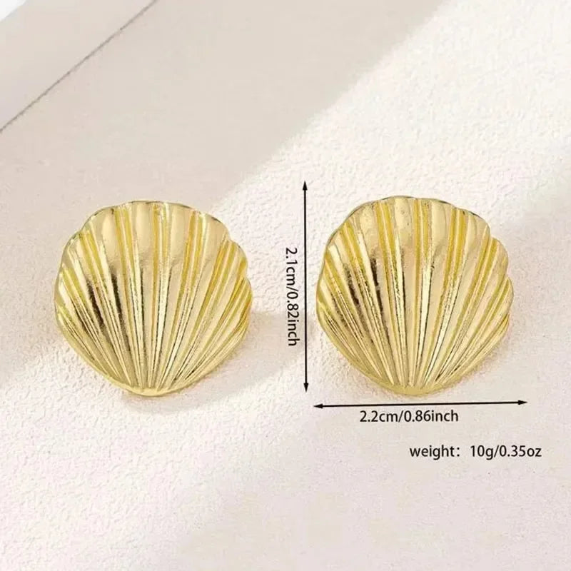 Boucles d'oreilles pendantes bohème à pompons — Étoile de mer et coquillage
