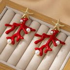 Coral and starfish earrings set in a jewelry box; red enamel, gold-tone, pearl-like beads