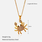 Gold-tone crab pendant necklace, 28mm charm, 400+50mm length, stainless steel