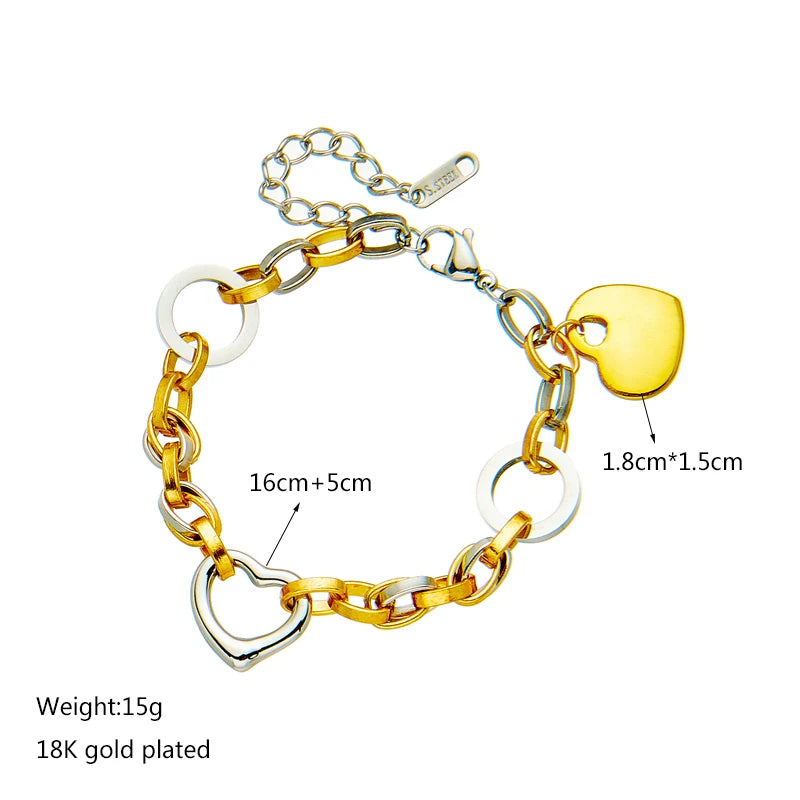 Two-tone heart charm chain bracelet with gold heart and silver heart-shaped links