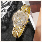 Gold-tone rhinestone watch angled view with three subdials and linked bracelet band