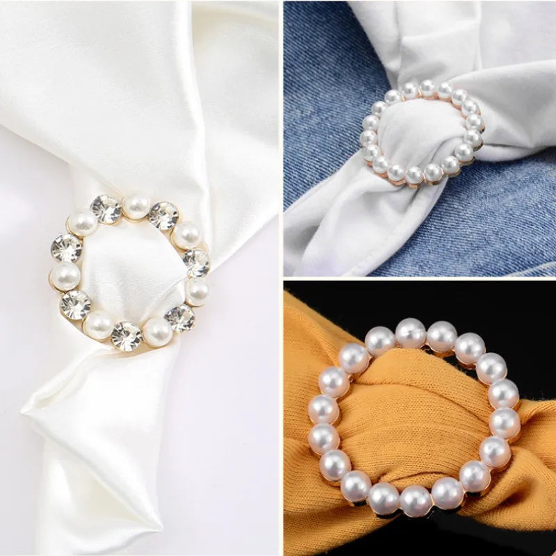 Round pearl and rhinestone scarf knot brooch clips, close-up