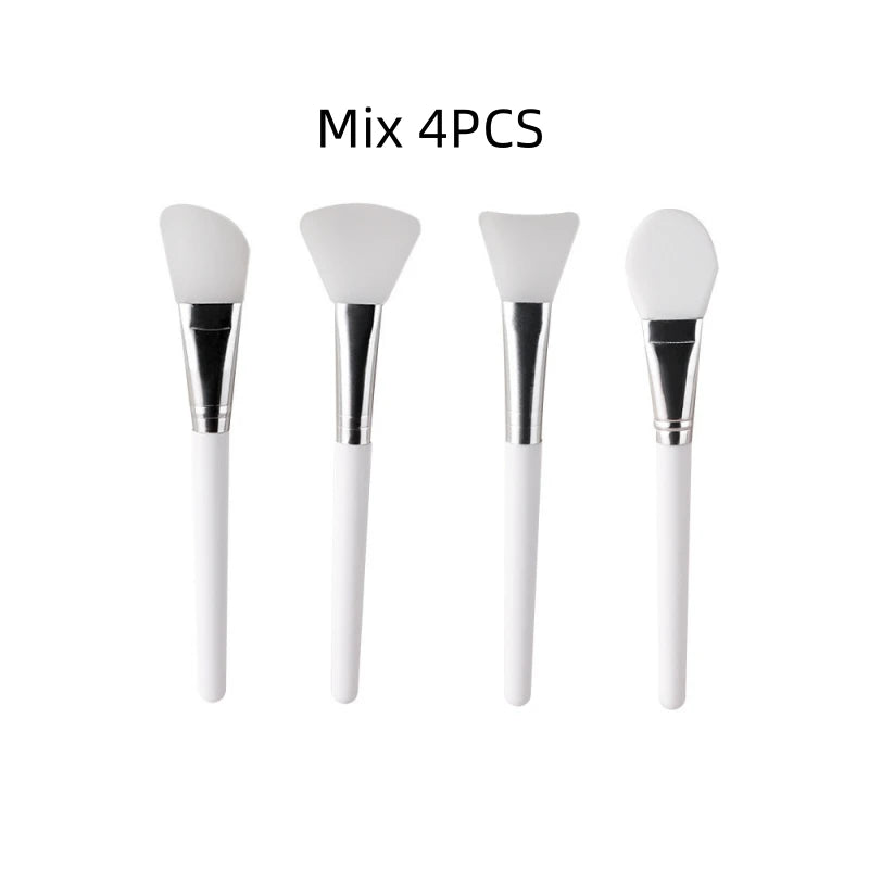 Set of 4 face mask brushes with white silicone heads and chrome collars