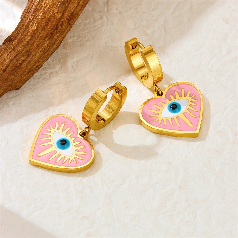 Gold-tone heart hoop earrings with pink enamel evil eye drop charms