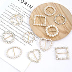 Assorted metal scarf knot brooch clips with faux pearls and rhinestone details