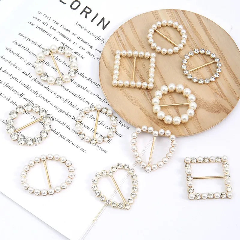 Assorted metal scarf knot brooch clips with faux pearls and rhinestone details