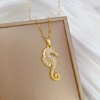 Gold-tone seahorse rhinestone pendant on linked chain