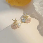 Boucles d'oreilles pendantes bohème à pompons — Étoile de mer et coquillage
