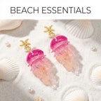 Jellyfish drop earrings with gold starfish tops and pink jellyfish pendants