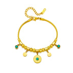 Gold-tone charm bracelet with green stone beads and round disc charms, lobster clasp