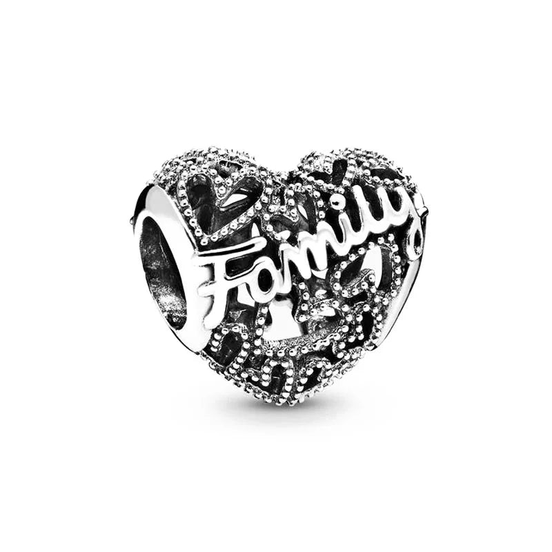 Sterling silver heart charm bead with “FAMILY” lettering and stone trim