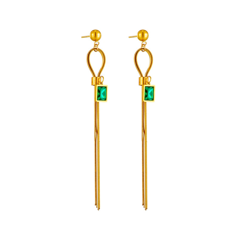 Gold-tone long drop earrings with round bead tops, green square charm, and fringe tassels