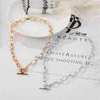 Gold- and silver-tone oval link collar necklaces with oval clasp and bar charm