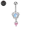 Curved barbell navel ring with oval opal center and pink heart crystal dangle