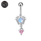 Curved barbell navel ring with oval opal center and pink heart crystal dangle