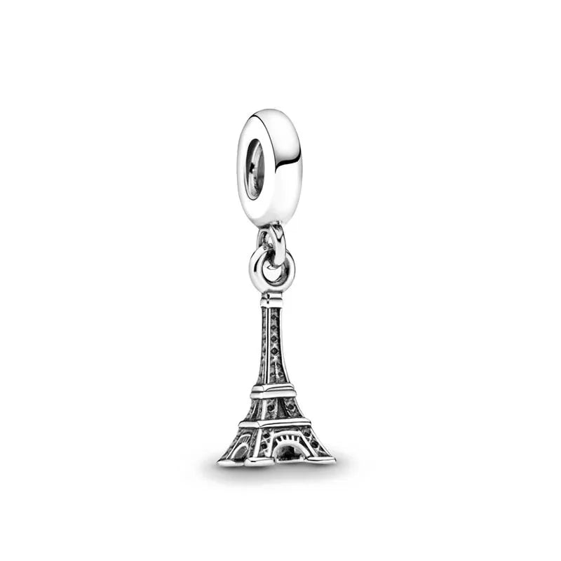 Sterling silver Eiffel Tower charm pendant hanging from a bead loop
