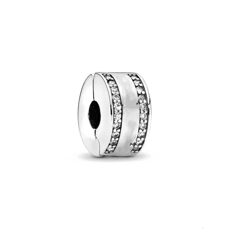 Round silver-tone charm bead with two rows of clear stones around the rim
