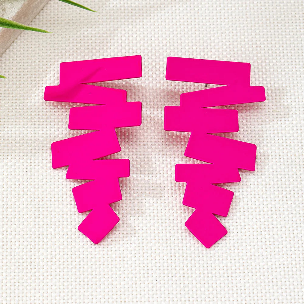 Geometric stud earrings in hot pink with stacked zigzag shapes and pointed ends