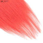 Red synthetic braiding hair strands with lighter tips, close-up