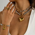 Heart charm ball-bead necklace set with gold heart pendant, ring, and bracelet