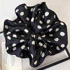 Polka dot black scrunchie set with two bow shapes and elastic gathered center