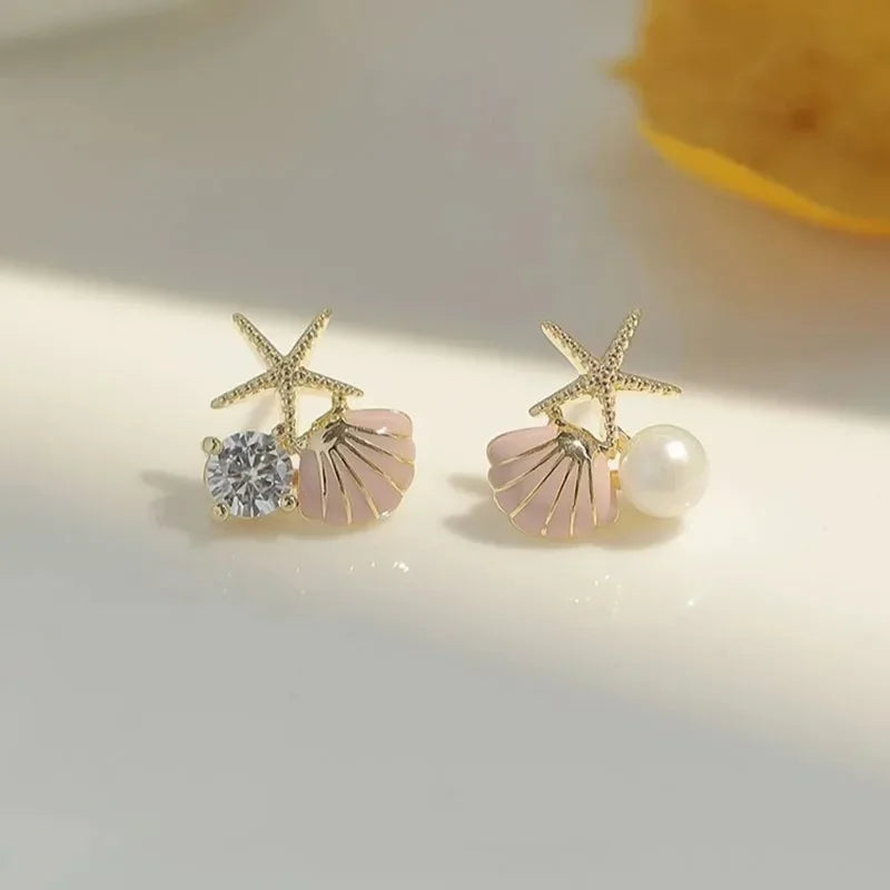 Boucles d'oreilles pendantes bohème à pompons — Étoile de mer et coquillage