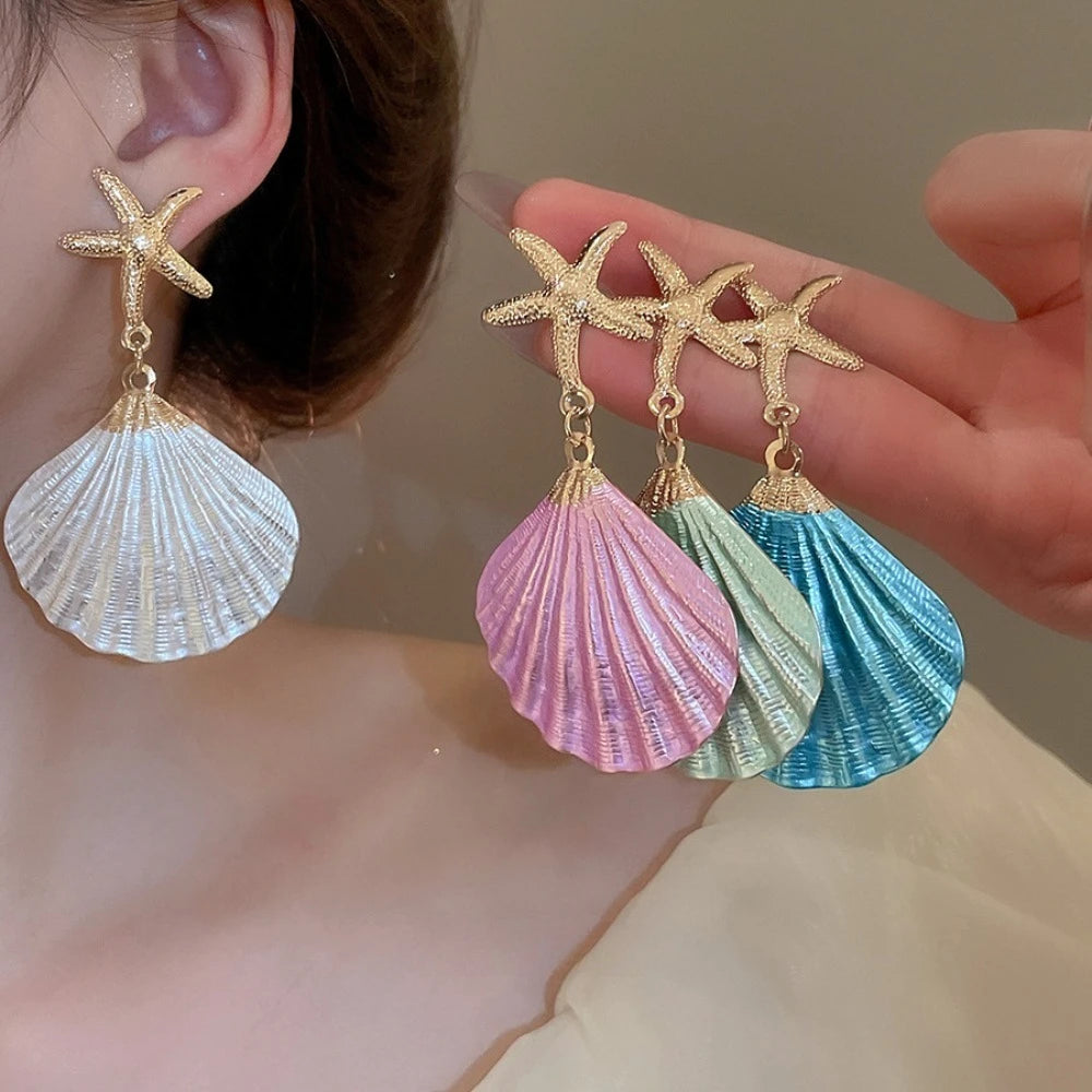 Starfish shell dangle earrings with gold starfish and purple, teal, blue shell drops