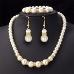 Pearl bridal jewelry set with pearl necklace, bracelet, and matching drop earrings