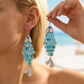 Koi fish earrings with blue eye, turquoise disc scales, silver fan tail tassel drop