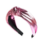 Wide PU leather headband in pink metallic with twisted knot top and elastic ends