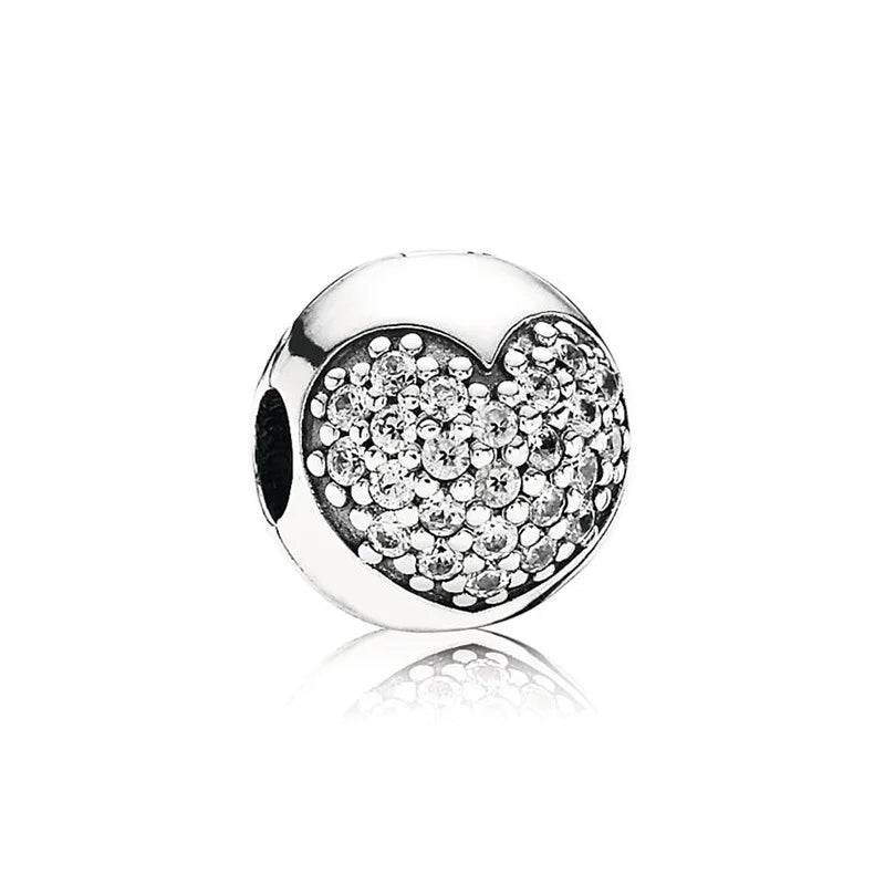 Sterling silver charm bead with a cluster of clear sparkling stones