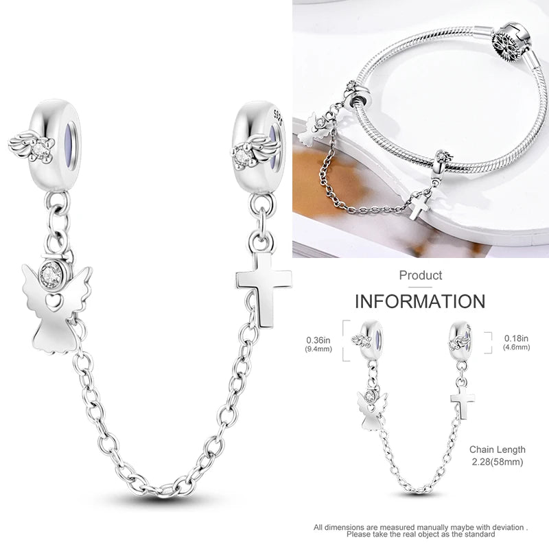 925 sterling silver cross charm with flower-like cutouts and clear stone accents