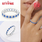 925 sterling silver evil eye ring with a row of blue stones along the band