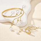 Gold-tone pearl bracelet and cuff-style ring with white pearl bead drops